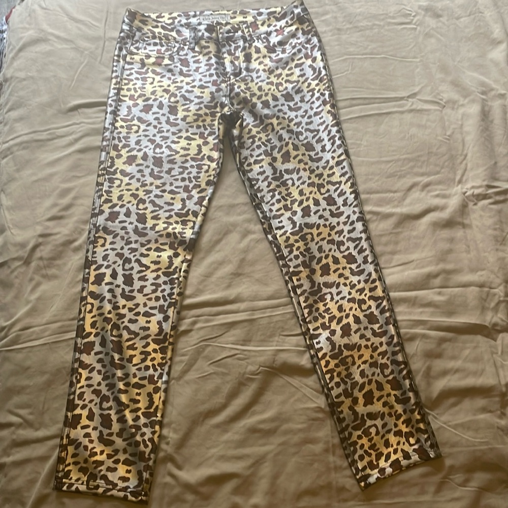 Cielo Jeans. Stretchy material pants, animal print gold, silver, black and brown
